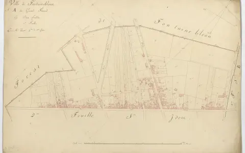 Plan ancien de la ville de Fontainebleau, section du Grand Fief, montrant parcelles et bâtiments. Ce cadastre historique révèle l'organisation du territoire.