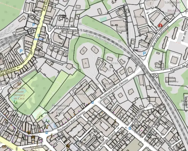 Plan de cadastre de Clermont-Ferrand, montrant des rues, des bâtiments et des espaces verts.