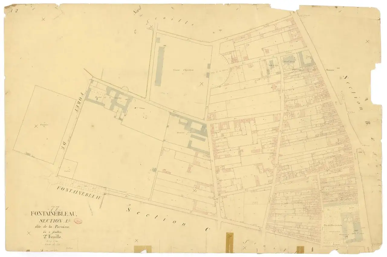 Plan ancien du cadastre de Fontainebleau, section 1, dite de la Paroisse. Il détaille des parcelles, des bâtiments et la forêt.